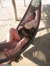 Obese nan Girdle Goddess bares her large tits and fat belly on a hammock